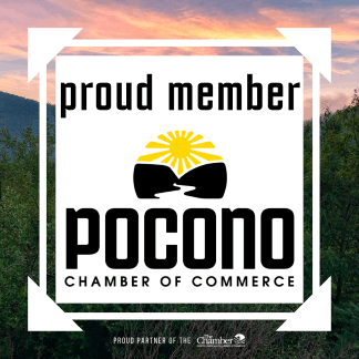 Proud member graphic for the Pocono Chamber of Commerce displayed over a scenic mountain background.